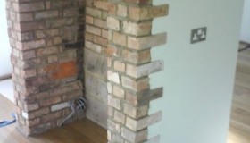 Brick Doorway With Wooden Flooring
